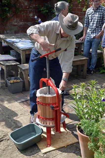 11. Mike operates the press.jpg